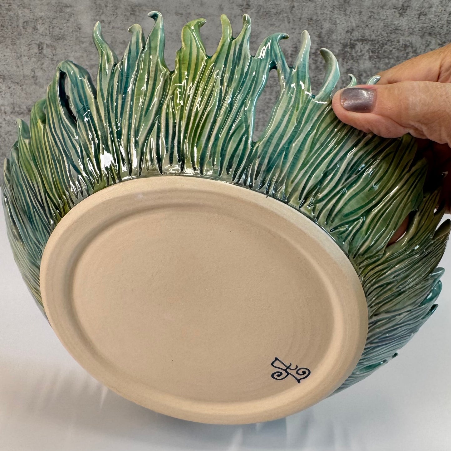 03 Fairy riding a fire bellied toad in a pond - White Stoneware